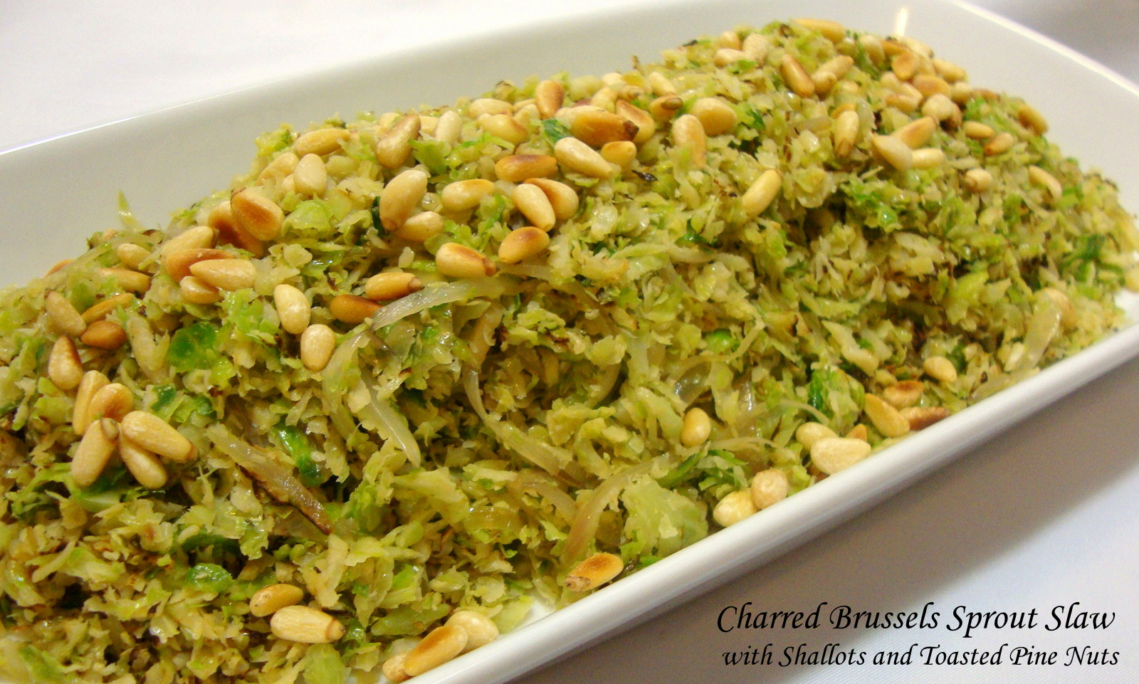 Charred Brussels Sprout Slaw with Shallots and Toasted Pine Nuts